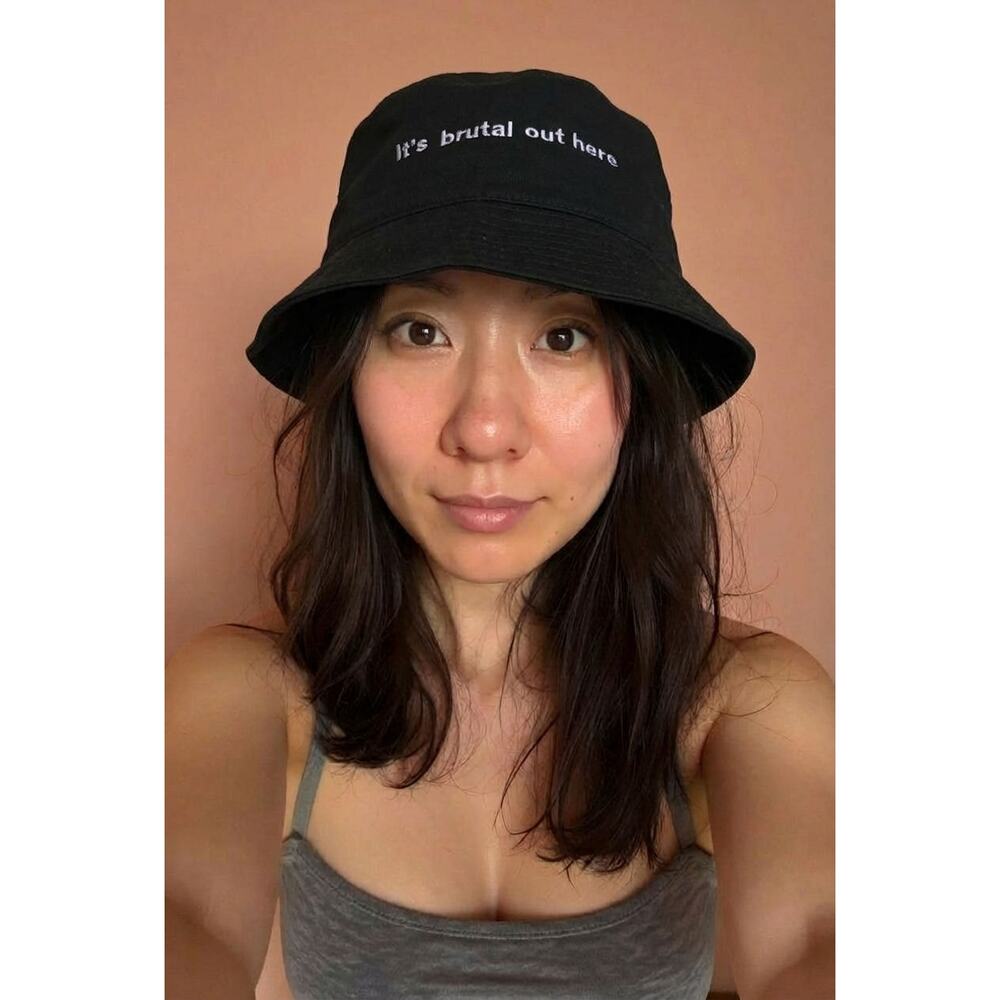Olivia Rodrigo “It’s brutal out here” black bucket hat